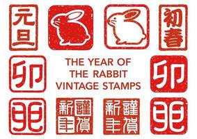 The Year Of The Rabbit Japanese New Years Greeting Stamp Set Isolated On A White Background. Text Translation - Happy New Year. New Years Day. The Rabbit. vector