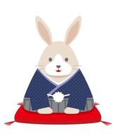 el año de la mascota del conejo vestido con kimono japonés ofreciendo sus saludos de año nuevo.