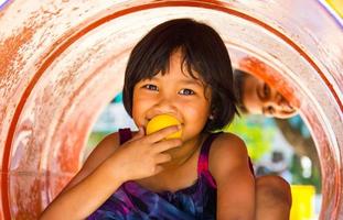 Girl sitting Playground photo