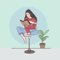 Young woman resting in armchair reading book at cozy home relaxed and rest for examination , hobby concept