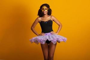 Brazilian Carnival. Young woman in costume enjoying the carnival party. photo