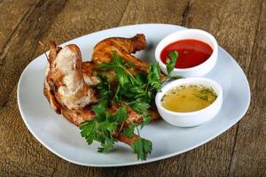 Roasted chicken on plate photo