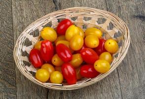 Yellow and red cherry tomatoes photo