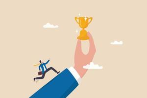 Motivation to achieve goal, reward or prize to motivate employee to succeed in work, effort and ambition to reach target concept, businessman run with full effort to reach trophy cup in giant hand.