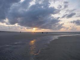 sundown at the beach of Juist photo