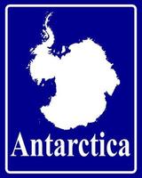 sign as a white silhouette map of Antarctica