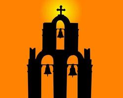Silhouette of a belltower against the orange sky