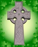 cruz celta sobre un trébol de hojas de fondo verde vector