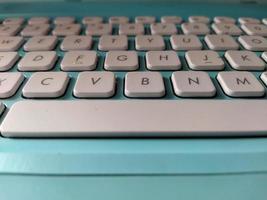 Turquoise computer keyboard photo