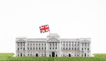 Buckingham Palace model house with UK flag