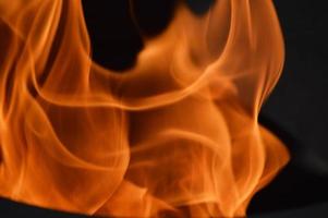 textura de llama de fuego. destellos de llama naranja. fondo abstracto para banner. el concepto de quema, combustión. foto