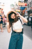 Portrait of happy traveller adut asian cute girl with glasses. photo