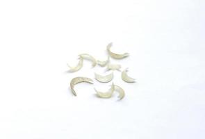 Pile of human nails isolated on white background. photo