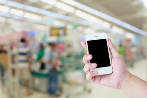 Supermarket store blur background ,Cashier counter with customer photo