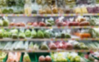 Shelf with fruits in supermarket photo