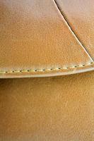 Brown leather texture closeup background photo