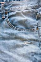 Close up of blue jeans photo