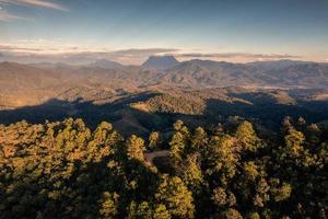 Aerial view of Doi Luang Chiang Dao mountain in tropical rainforest on national park at evening photo