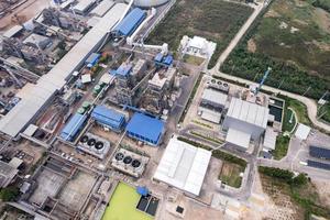 Aerial view of building infrastucture of industry power plant, smart chamical, gas and oil refinery pipeline warehouse