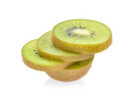 Slice of kiwi isolated on white background. photo