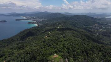 Aerial view of sand beach and water surface texture. Foamy waves with blue sky and clouds. Beautiful tropical beach. Amazing sandy coastline with white sea waves. Nature, seascape and summer concept. video