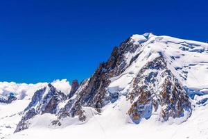 Snowy mountains Chamonix, Mont Blanc, Haute-Savoie, Alps, France photo