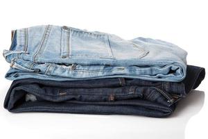 Stack of blue jeans photo