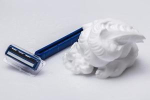 Shaving razor and foam photo