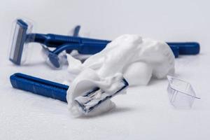 Shaving razors and foam photo