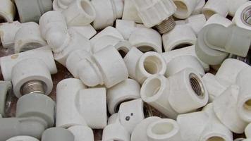 Many White Pvc Water Supply Pipe Fittings Close Up video