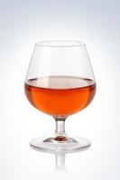Glass of cognac photo