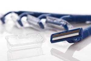 Shaving razor on white background photo