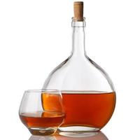 Bottle and glass with cognac photo