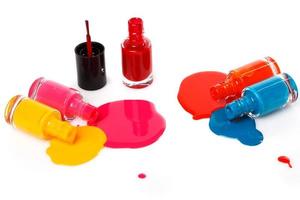 Bottles with spilled nail polish photo