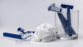 Shaving razors and foam photo