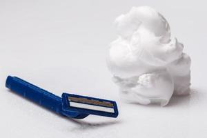 Shaving razor and foam photo