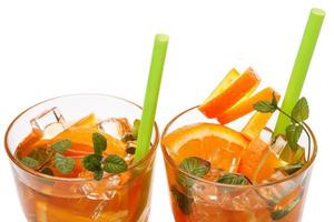 Refreshing lemonade with oranges and mint photo