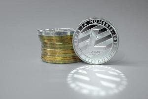 Silver Litecoin LTC cryptocurrency coin stack, Crypto is Digital Money within the blockchain network, is exchanged using technology and online internet exchange. Financial concept photo