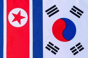 Korea against North Korea flags. Sanctions, war, conflict, Politics and relationship concept photo