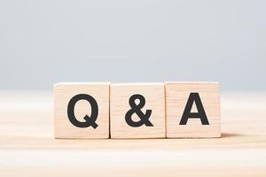Q and A word with wooden cube block. FAQ, frequency asked questions, Answer, Question  Ask, Information, Communication and Brainstorming Concepts photo