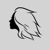 silhouette or icon of a beautiful woman with beautiful flowing hair which is very suitable to be used as a salon logo or hair care vector