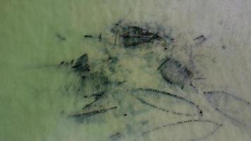 Aerial view look down spoil abandoned wooden boat sink