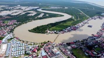 Aerial view Kuala Kurau bridge at curve river video