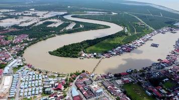 Aerial view Kuala Kurau bridge at curve river video