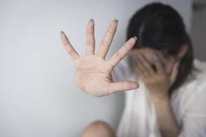 Women raising their hands to forbid anything that is sexually violent. Campaign to stop violence against women These include rape and human trafficking, depression, stress, mental problems. photo