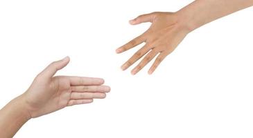 Close up Asian two female hands reaching for each other, help, shaking hands, sign arm and hand isolated on a white background copy space symbol language photo