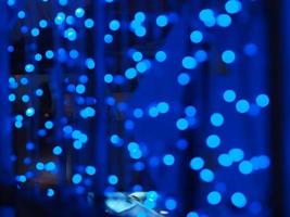 blue dot Bokeh Effect light Background photo