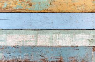 Vintage wood background texture old wood material or Vintage wallpaper colors Patterned of brightly colored panels of weathered painted wooden boards photo