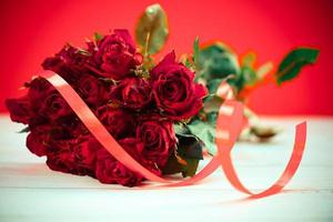 Natural fresh red roses flower bouquet with ribbon - Close up rose background flowers romantic love valentine day concept , Multicolored flowers Bloom photo