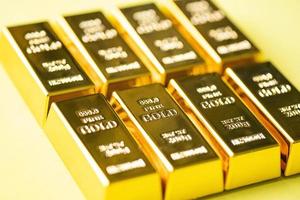 Gold bars on yellow background, gold bars financial business economy concepts, wealth and reserve success in business and finance